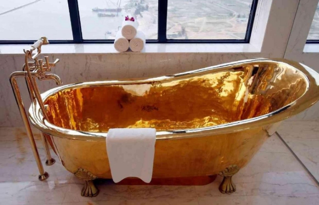 Who gives a 24 karat solid gold bathtub as a birthday gift.